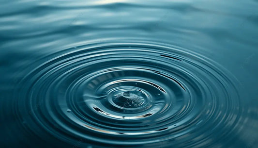 Ripples spreading across calm water